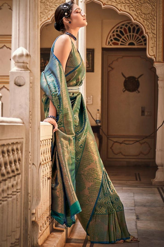Party Look Awesome Kamjivaram Saree In Green Color