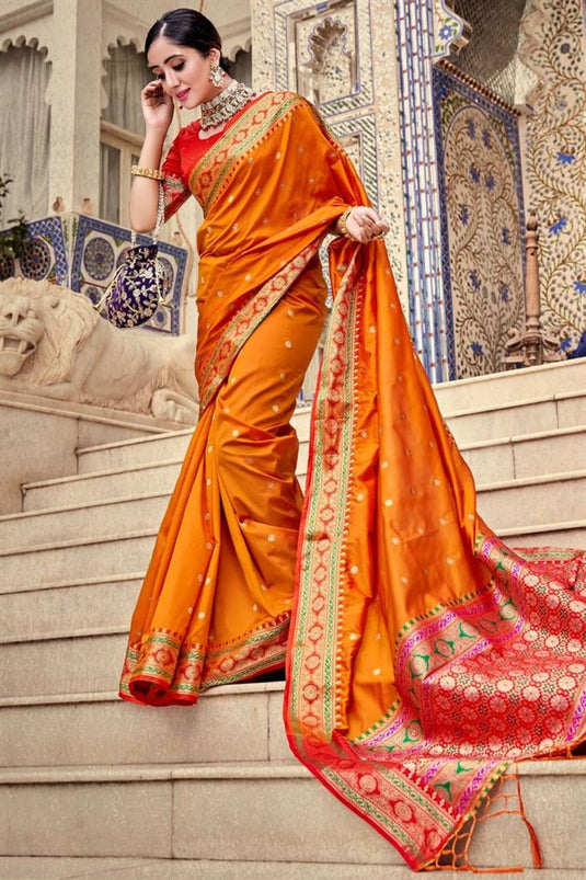 Orange Color Art Silk Fabric Riveting Saree With Weaving Designs