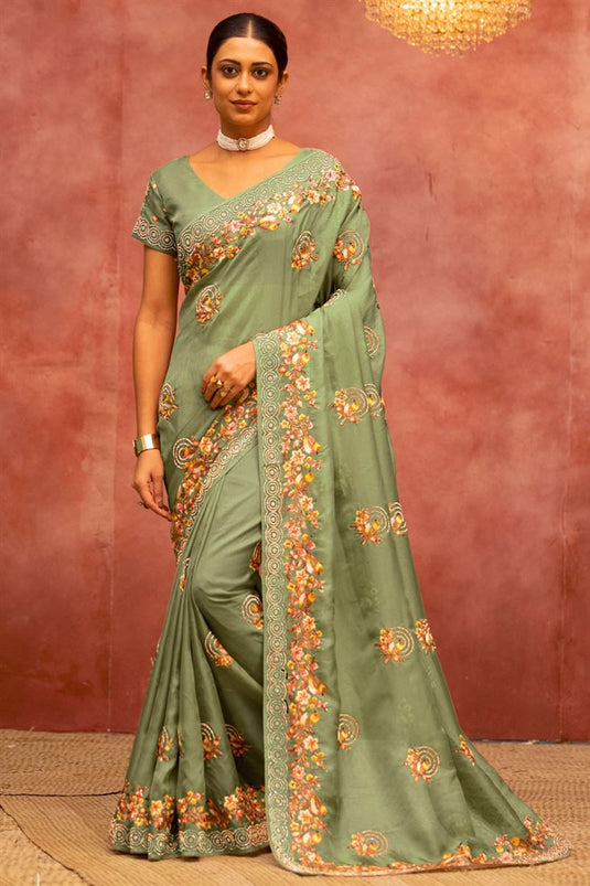 Tempting Net Fabric Green Color Saree With Embroidered Work