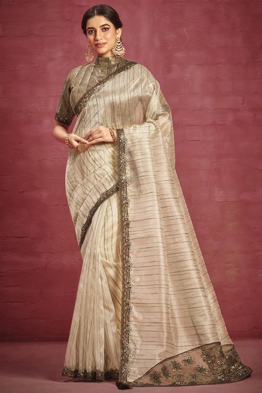 Beige Color Organza Fabric Engaging Saree With Border Work