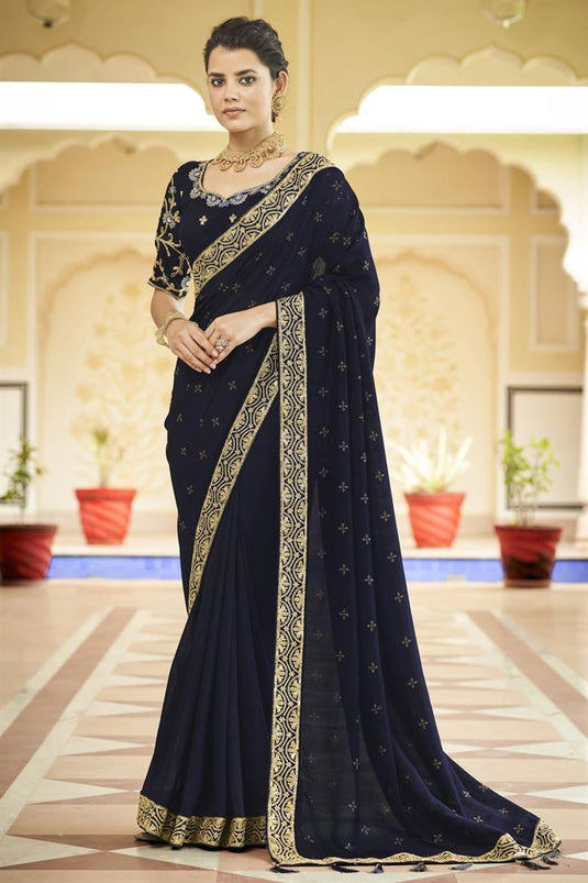 Border Work On Captivating Fancy Fabric Saree In Navy Blue Color