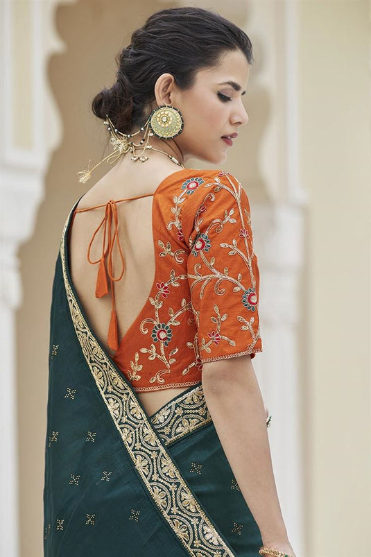Border Work Flamboyant Fancy Fabric Saree In Teal Color