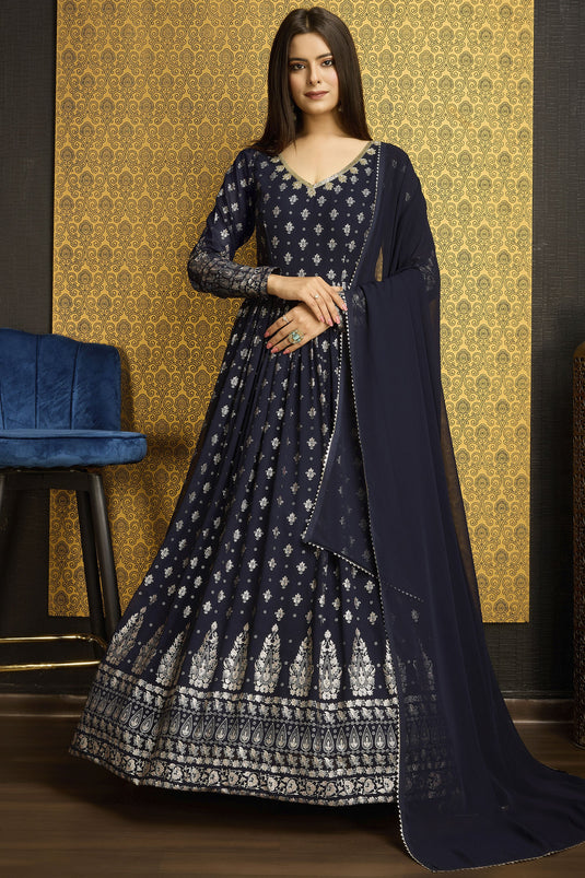 Radiant Navy Blue Color Function Wear Foil Work Georgette Readymade Gown With Dupatta
