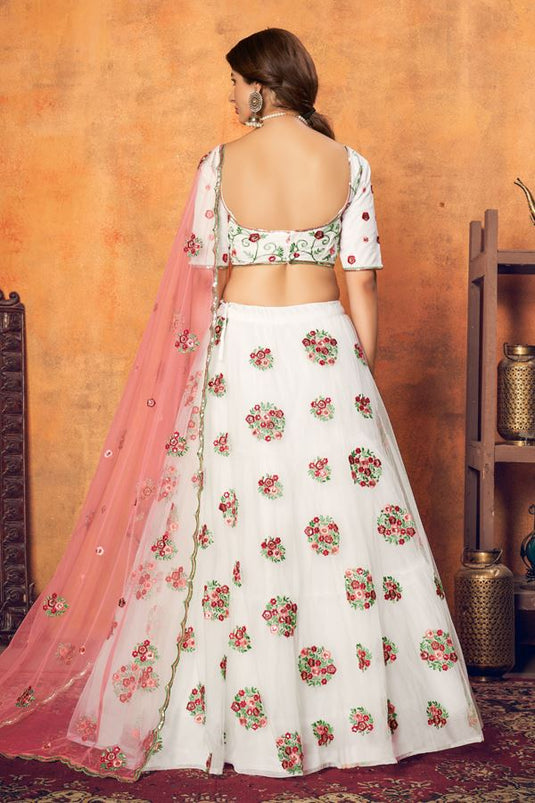 Net Fabric Sangeet Wear Off White Color Embroidered Lehenga Choli