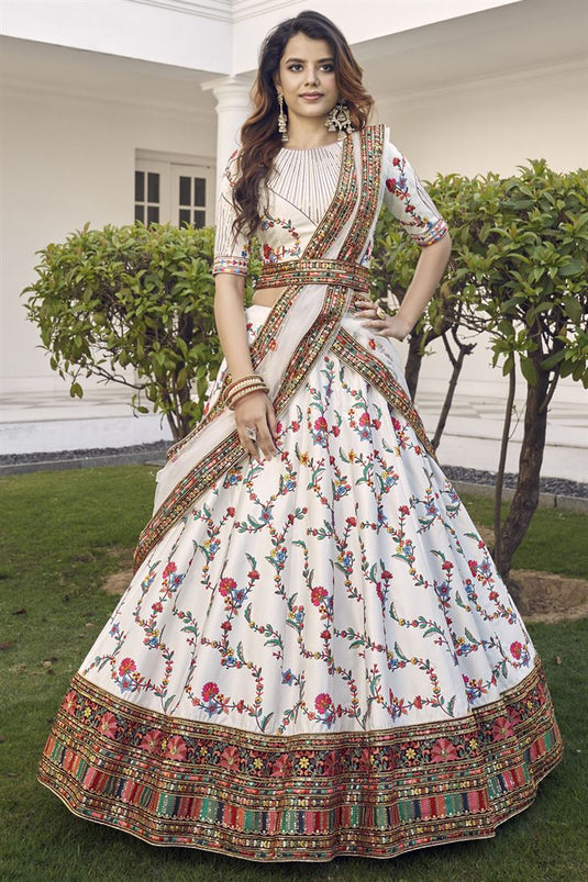 Elegant Art Silk Fabric With Embroidered Work Off White Color Lehenga