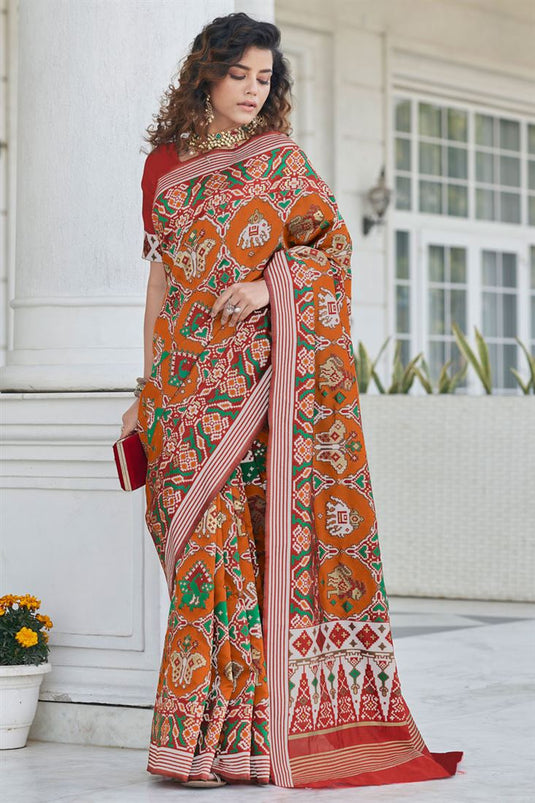 Orange Color Patola Silk Fabric Engaging Weaving Work Saree