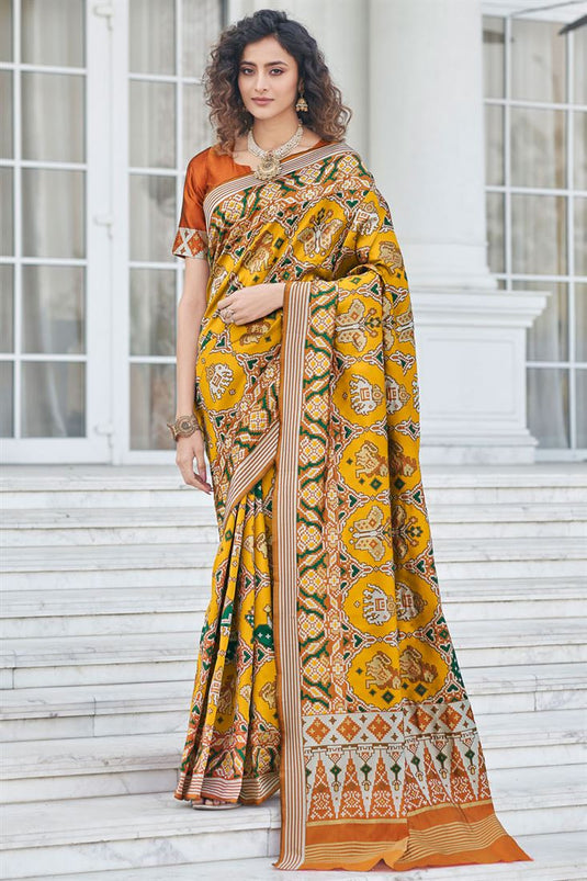 Mustard Color Patola Silk Fabric Royal Weaving Work Saree