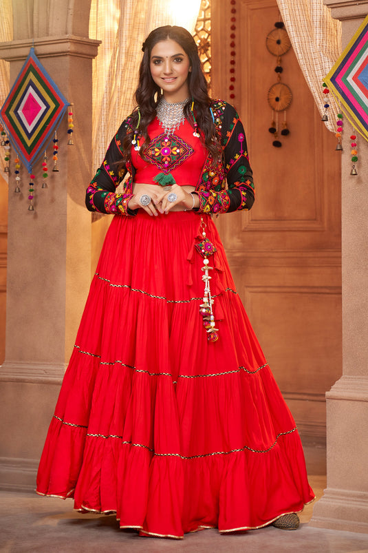 Navratri Special Embroidered Work On Red Color Embellished Viscose Rayon Fabric Lehenga Choli