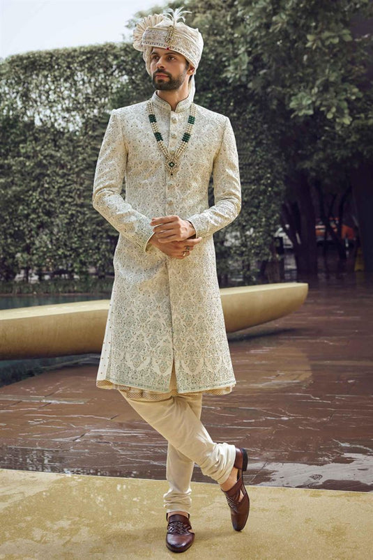 Splendiferous Off White Color Fancy Fabric Heavy Embroidered Designer Indowestern Groom Sherwani