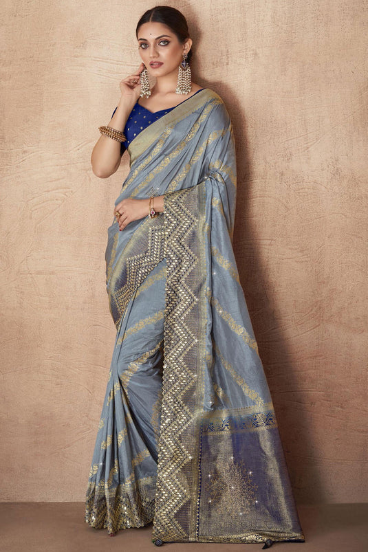 Grey Color Weaving Work Silk Fabric Saree With Designer Blouse