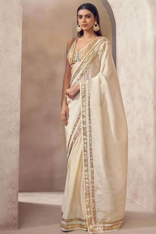 Exclusive Beige Color Silk Fabric Hand Embroidered Sangeet Wear Readymade Saree