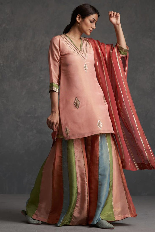 Exclusive Pink Color Silk Fabric Hand Embroidered Festive Wear Enriching Readymade Sharara Set