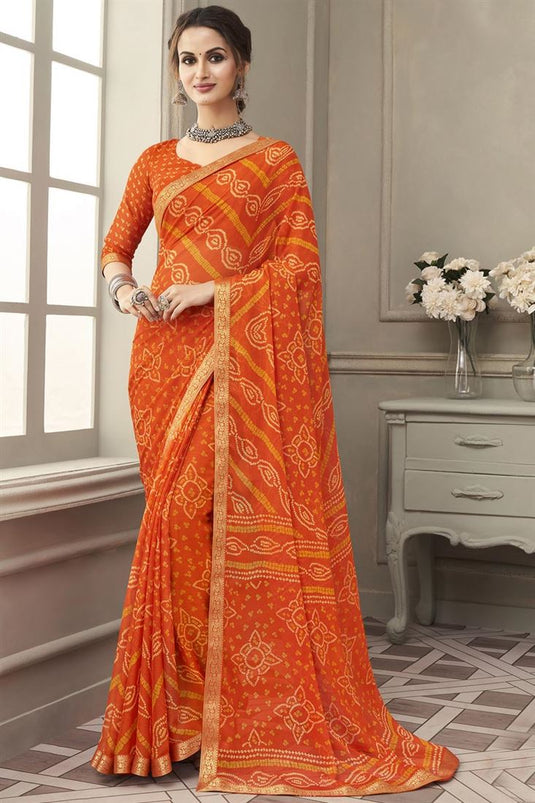 Orange Color Chiffon Fabric Casual Bandhani Print Saree