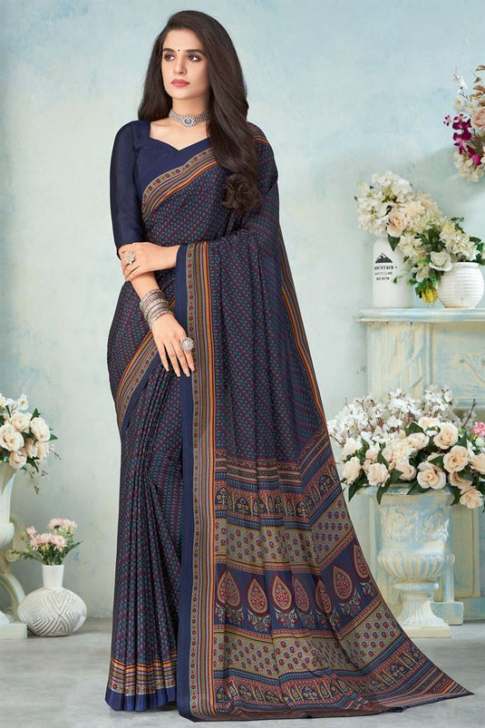 Fetching Crepe Silk Fabric Daily Wear Printed Work Uniform Saree In Navy Blue Color