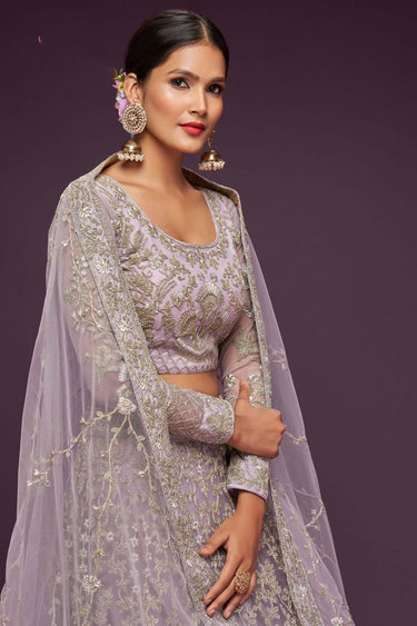 Embellished Embroidered Work On Lavender Color Net Fabric Lehenga