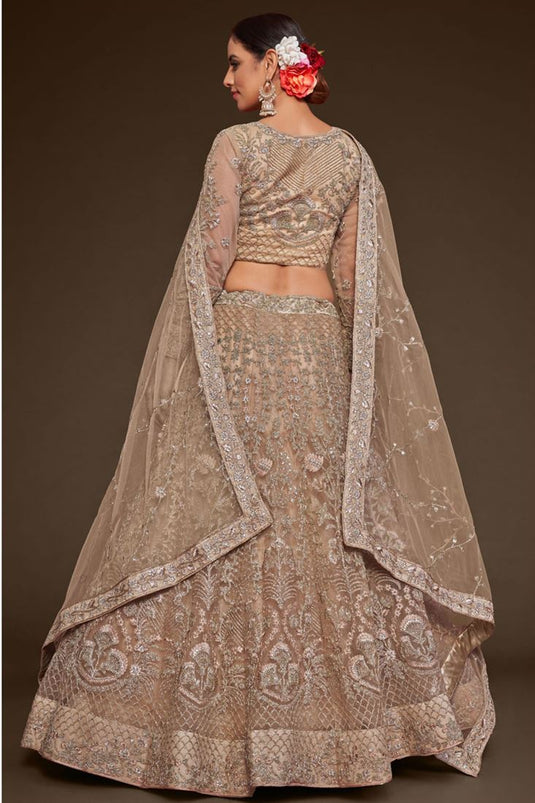 Net Fabric Beige Color Winsome Embroidered Work Lehenga