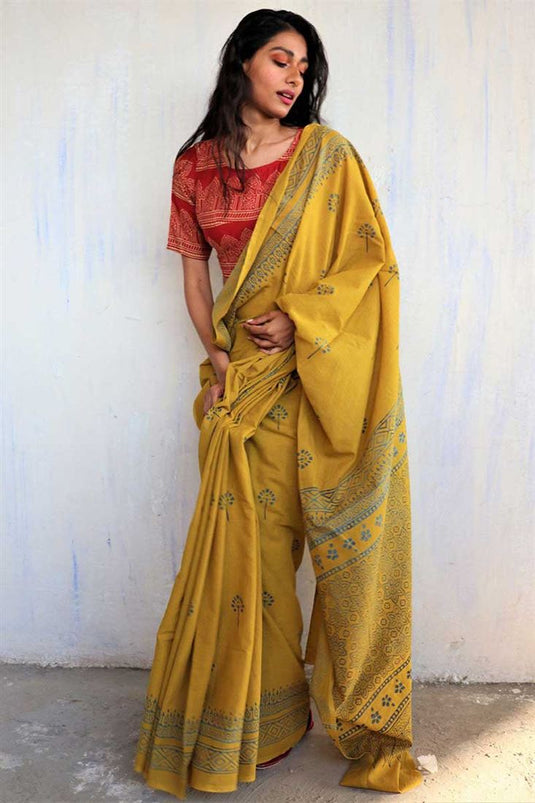Charming Mustard Color Cotton Fabric Jaipuri Saree