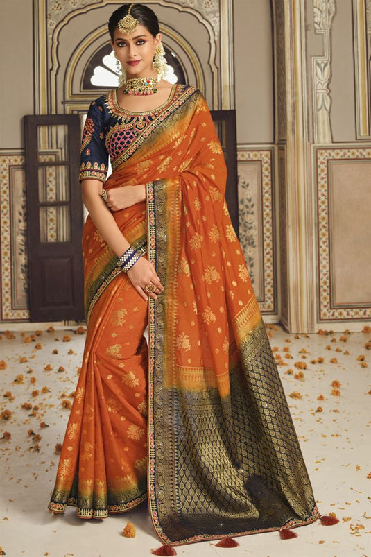 Attractive Orange Banarasi Silk Saree With Designer Blouse