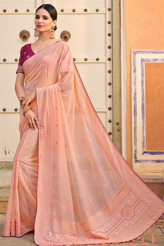Beguiling Embroidered Work On Peach Color Art Silk Saree