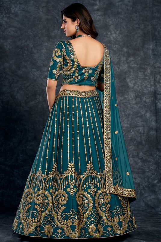 Silk Fabric Sangeet Wear Wonderful Lehenga In Teal Color