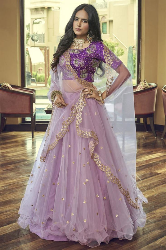 Engaging Lavender Color Net Fabric Lehenga With Embroidered Work