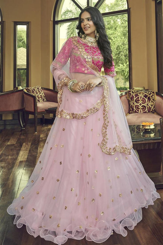 Net Fabric Pink Color Lehenga With Winsome Embroidered Work