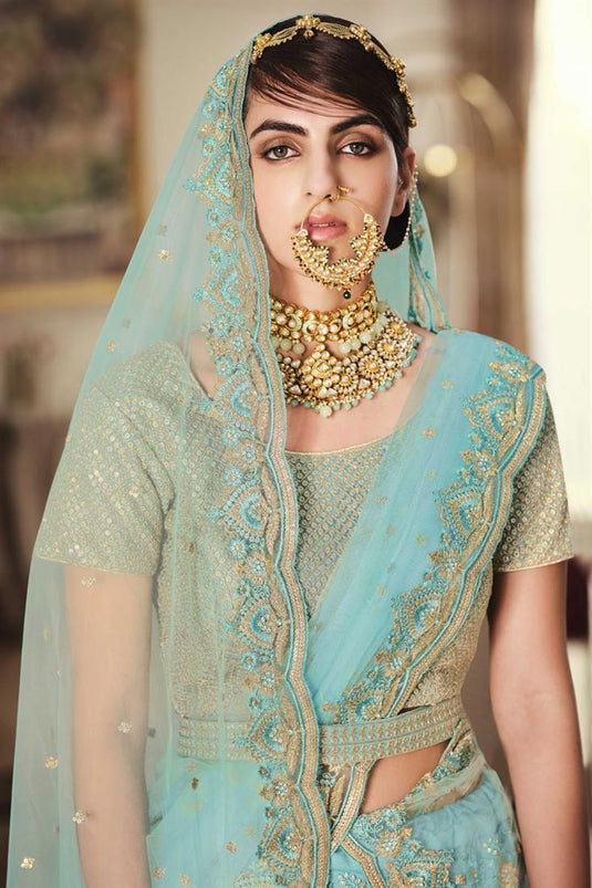 Cyan Color Embroidered Wedding Wear Lehenga Choli In Net Fabric