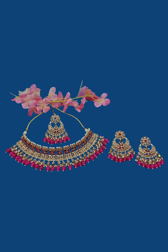 Rani Color Fascinating Alloy Material Necklace Set Earrings And Mang Tikka For Women