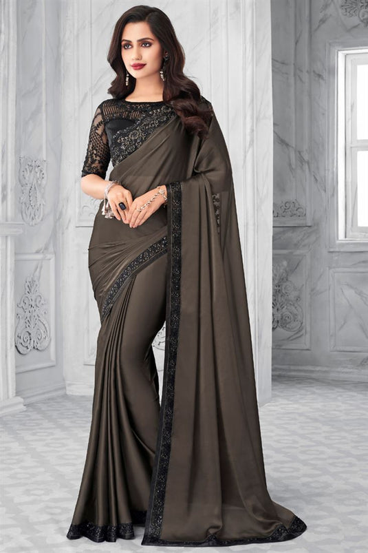 Charming Georgette Fabric Dark Beige Color Party Wear Saree With Embroidered Work