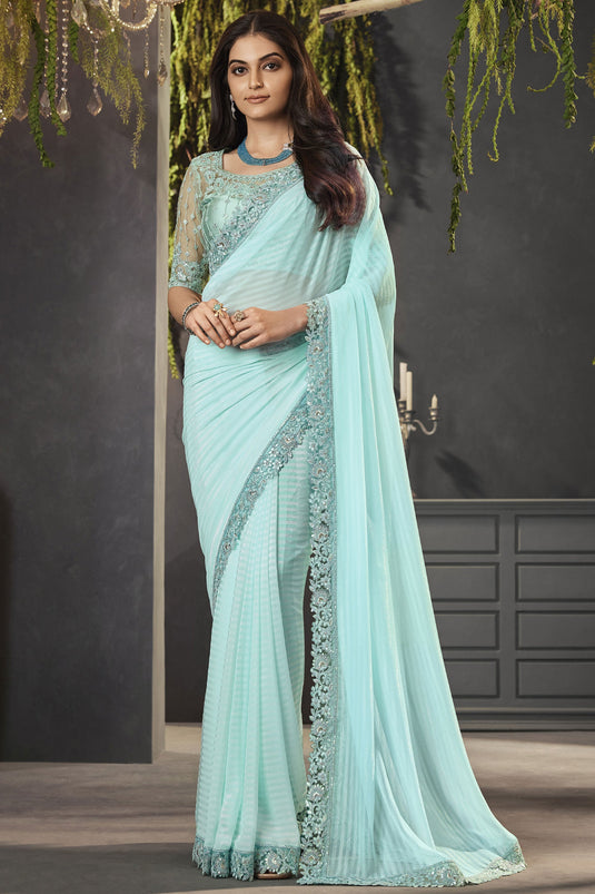 Sea Green Color Stylish Lace Border Work Georgette Fabric Saree With Embroidered Blouse