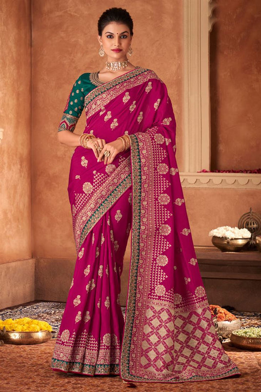 Weaving Work Rani Color Saree In Dola Silk Fabric