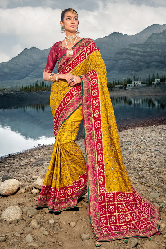 Dazzling Mustard Color Pure Gajji Bandhani Satin Saree With Heavy Embroidered Silk Blouse