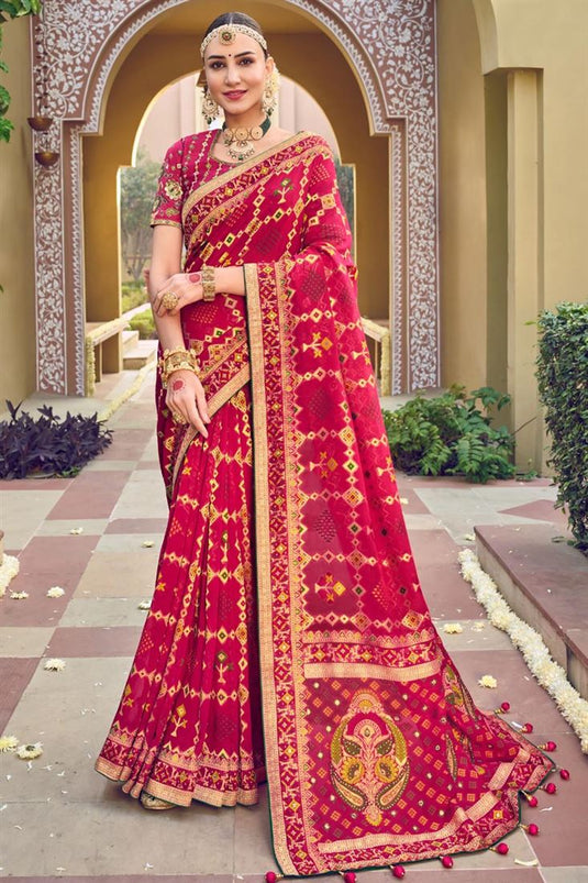 Georgette Fabric Rani Color Wedding Wear Engaging Saree