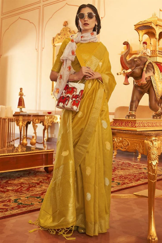 Golden Color Tempting Weaving Work Saree In Organza Fabric