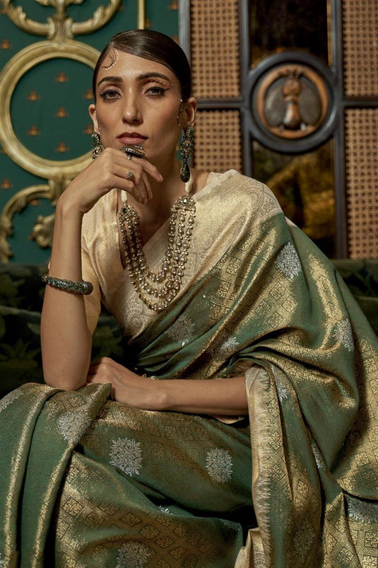 Beguiling Weaving Designs Green Color Art Silk Fabric Saree