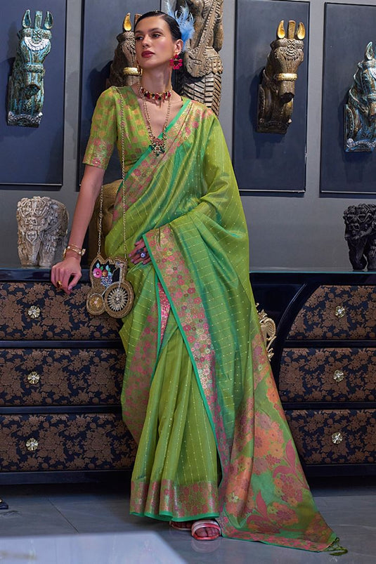 Function Style Mesmeric Sequins Work Organza Saree In Green Color