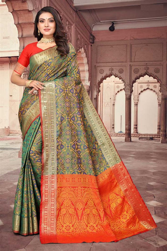 Marvelous Patola Silk Fabric Weaving Work Saree In Green Color
