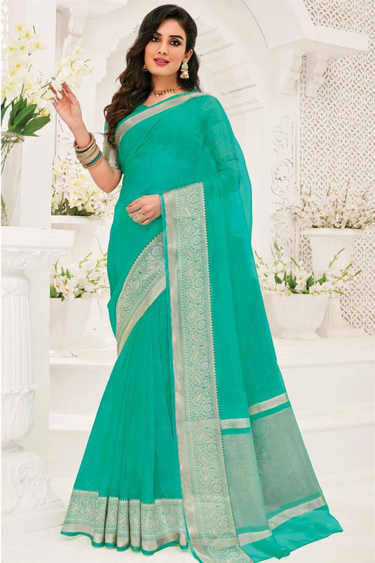 Casual Wear Organza Fabric Sea Green Color Saree With Fascinating Weaving Border Work