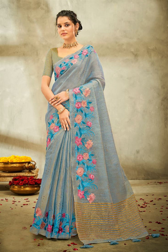 Classic Linen Fabric Floral Embroidered Saree in Blue Color