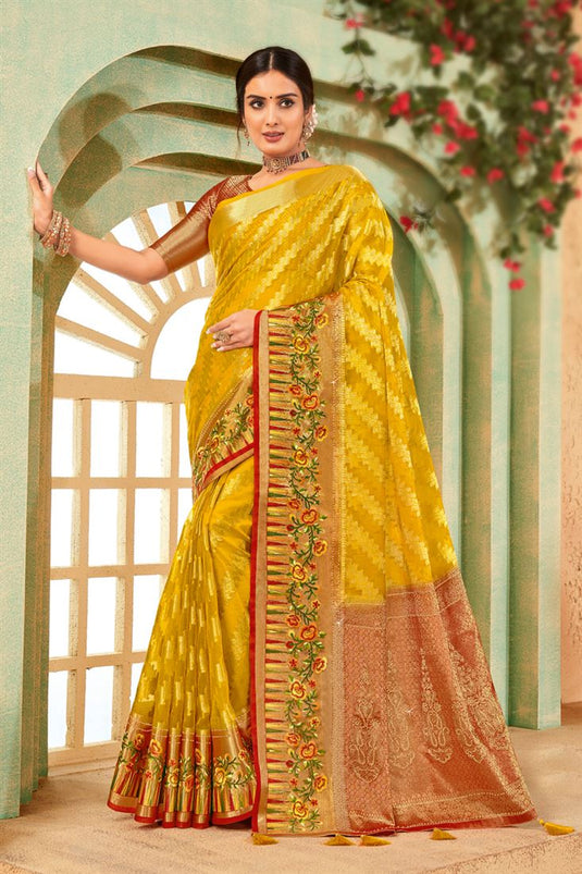 Radiant Weaving Work Yellow Color Organza Saree