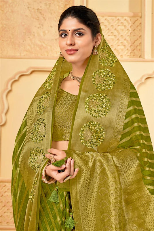 Engaging Green Organza Saree With Weaving Work