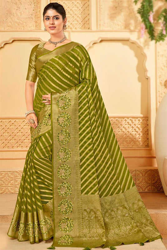 Engaging Green Organza Saree With Weaving Work