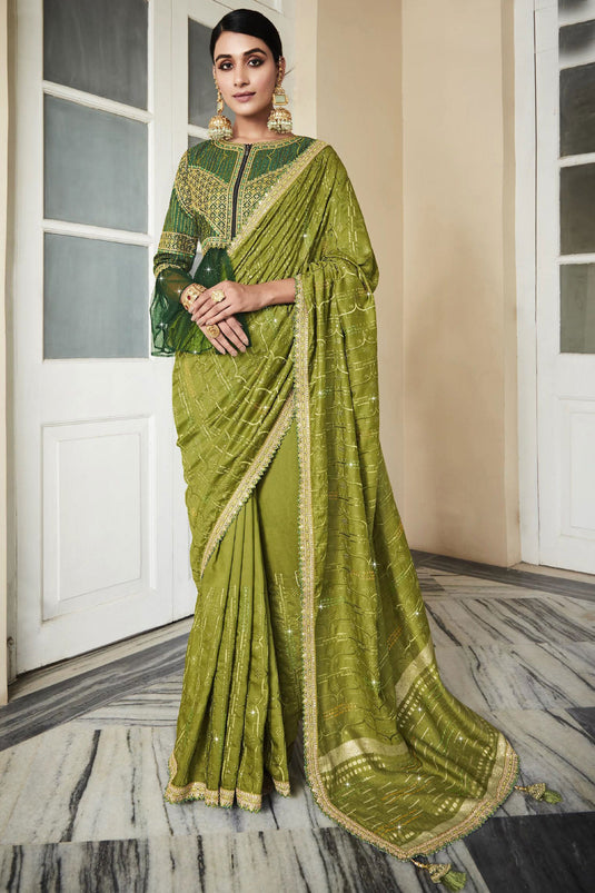 Green Color Silk Fabric Festive Wear Saree With Embroidered Designer Blouse