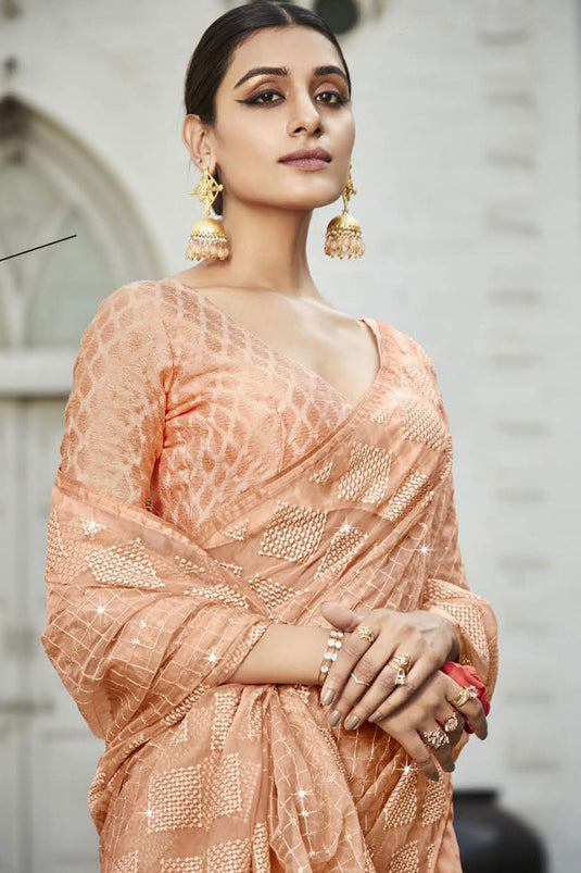 Embroidered And Stone Work Party Style Wondrous Organza Saree In Peach Color