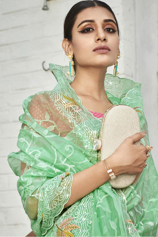 Party Style Embroidered And Stone Work Sea Green Color Supreme Organza Saree