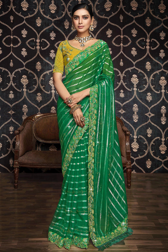 Excellent Organza Fabric Green Color Saree With Border Work
