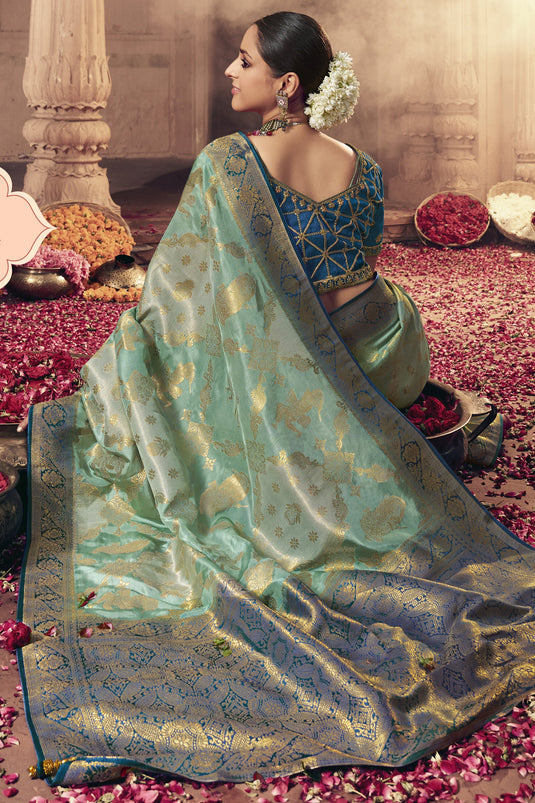 Art Silk Fabric Wedding Wear Sea Green Color Fancy Heavy Weaving Work Saree With Embroidered Blouse
