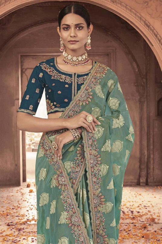 Incredible Embroidered Work On Sea Green Color Tissue Silk Saree