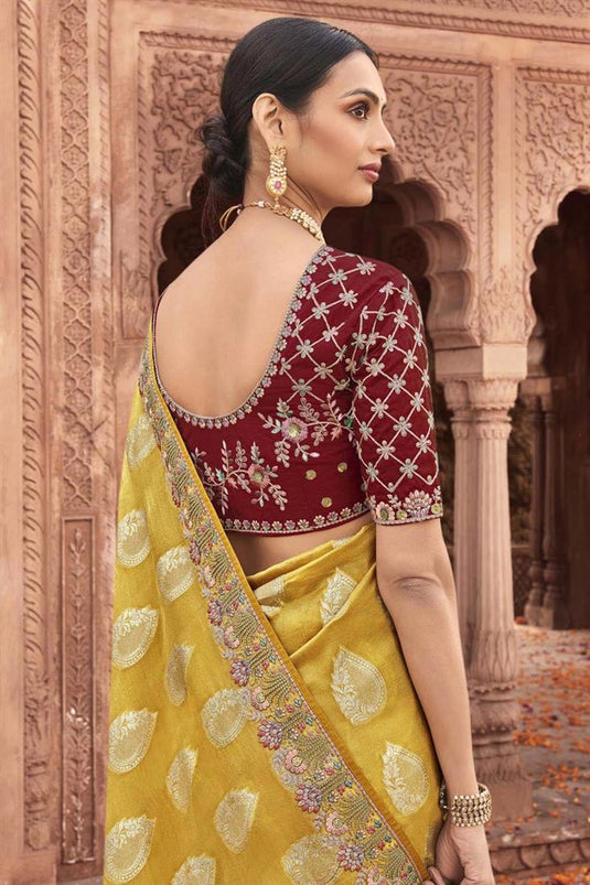Tempting Yellow Color Tissue Silk Saree With Embroidered Work
