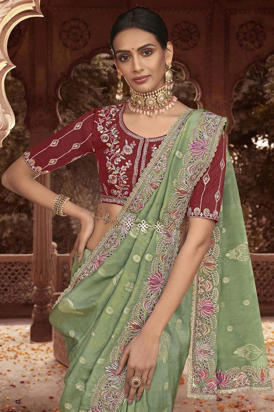 Graceful Green Color Tissue Silk Saree With Embroidered Work
